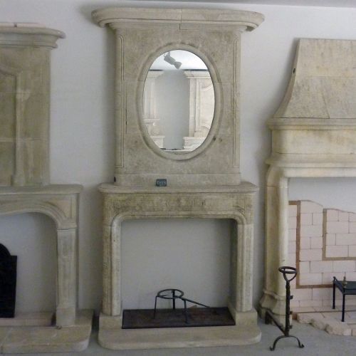 Cheminée à trumeau de style transition réalisée en pierre de taille - Atelier Alain BIDAL (Provence)